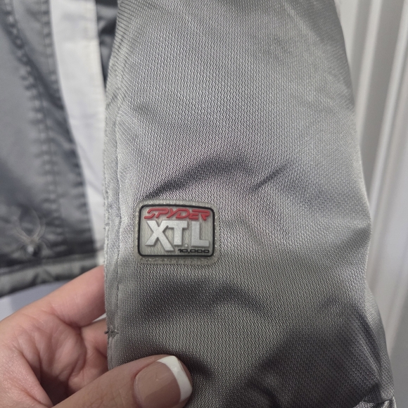 Spyder XT.L Girl Reflective Silver & White Waterproof Winter Ski Jacket Size 14 - Picture 8 of 16